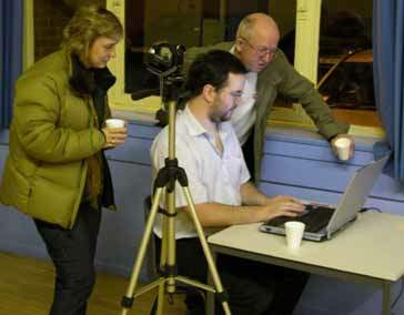 Members working on their film