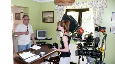 01. Joanna, the stills photographer for the calendar, talking to Ray before the kitchen scene