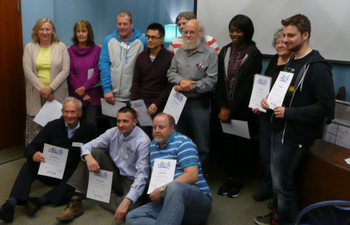 Course students with certificates