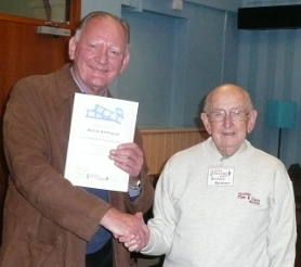 Keith receives his course certificate