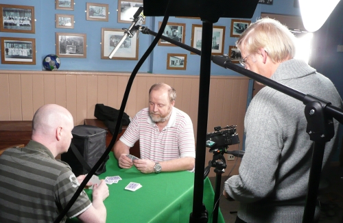 Oli, Chas and Jim filming a card game