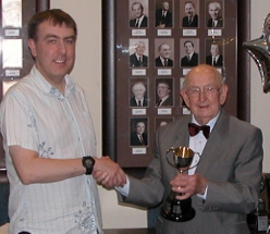 Dave receives the Bourne Cup from Bernard, the first of 3 winning trophies
