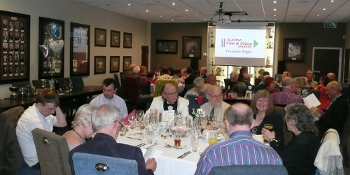 Members and guests at their tables