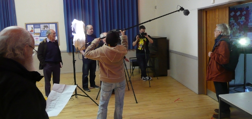 Members filming a scene from Anne's script