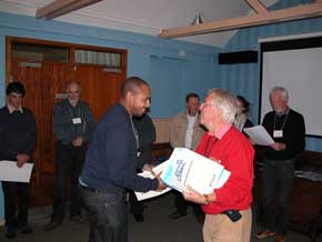 Laurie presenting 2012 students with course certificate