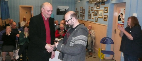 Ian receives the shield from the guest judge Geoff Harmer