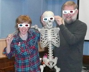 Kate and Dave with the skeleton and 3D glasses